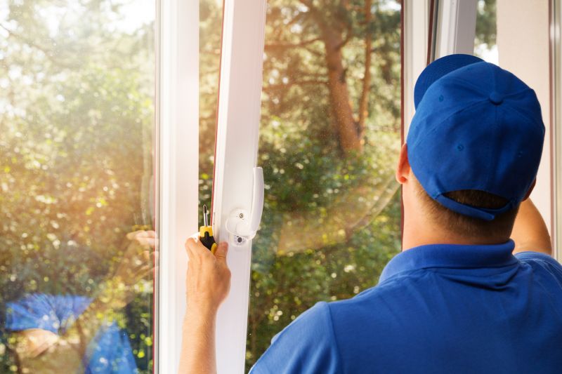 Professional window installers preparing for work